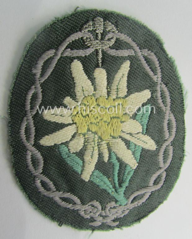 'Variant'- (ie. first-) pattern, WH (Heeres) 'Gebirgsjäger'- (ie. mountain-troopers-) related arm-badge being a desirable example as was executed in the 'BeVo'-weave pattern on a field-grey-coloured background