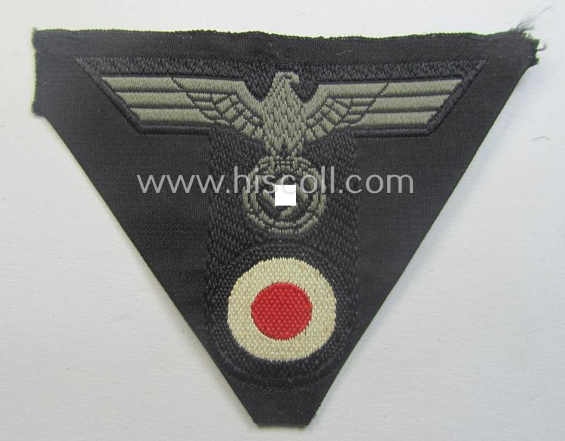 WH (Heeres) so-called: 'T-shaped'- (ie. 'M42-pattern'-) cap-eagle/cocarde (ie. cap-trapezoid) as was specifically produced for usage on the (impopular) black-coloured, 'M-42'-model 'Panzer'-side-caps (ie. 'Schiffchen')