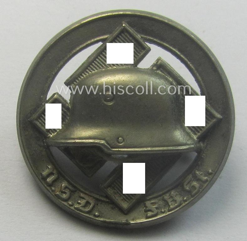 Membership lapel-pin: 'Nationalsozialistischer Deutscher Frontkämpferbund Stahlhelm' (or: 'N.S.D.F.B.St.') being a very detailed- and/or: maker- (ie. 'E.V.' - 'Ges.Gesch'-) marked example that is executed in silver-toned 'Buntmetall'