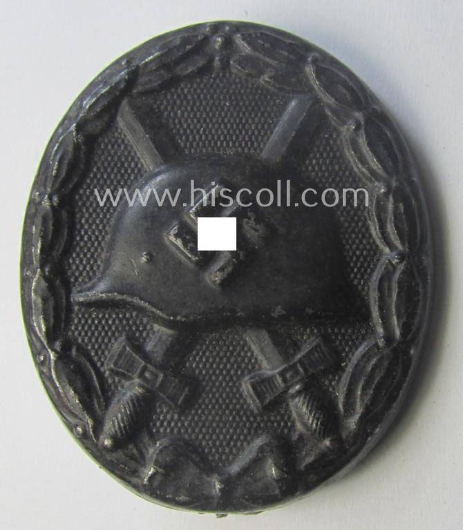 Maker- (ie. '63'-) marked example of a black-class wound-badge (or: 'Verwundeten-Abzeichen in Schwarz') being an example that was produced by the maker (ie. 'Hersteller') named: 'F.J. Klast & Söhne'