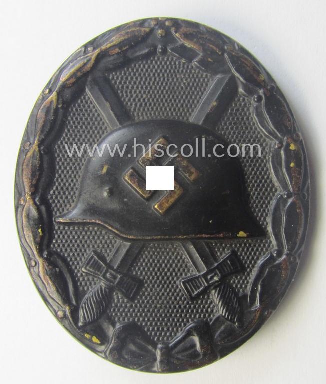 Moderately used- and/or worn, black-class wound-badge (or: 'Verwundeten-Abzeichen in Schwarz') being a typical non-magnetic and/or non-maker-marked example