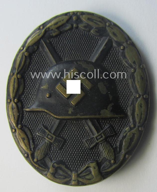 Moderately used- and/or worn, black-class wound-badge (or: 'Verwundeten-Abzeichen in Schwarz') being a typical non-magnetic and/or non-maker-marked example