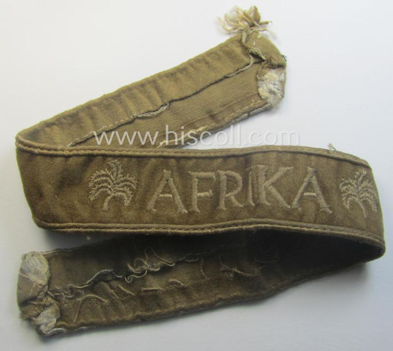 Moderately used, WH cuff-title (ie. 'Ärmelstreifen') entitled: 'Afrika' (being a minimally shortened example that comes in an overall very nice- (ie. issued and clearly worn ie. once tunic-attached-), condition