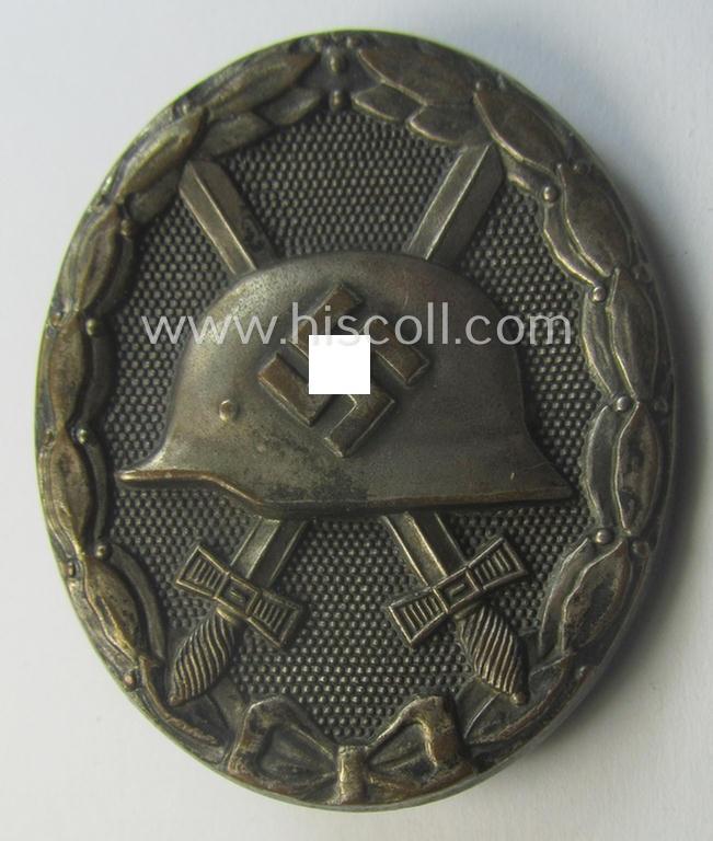 Unusually found, 'Verwundeten-Abzeichen in Silber' being a clearly maker- (ie. '13'-) marked, 'Buntmetall'-based example by the maker (ie. 'Hersteller') named: 'Gustav Brehmer'