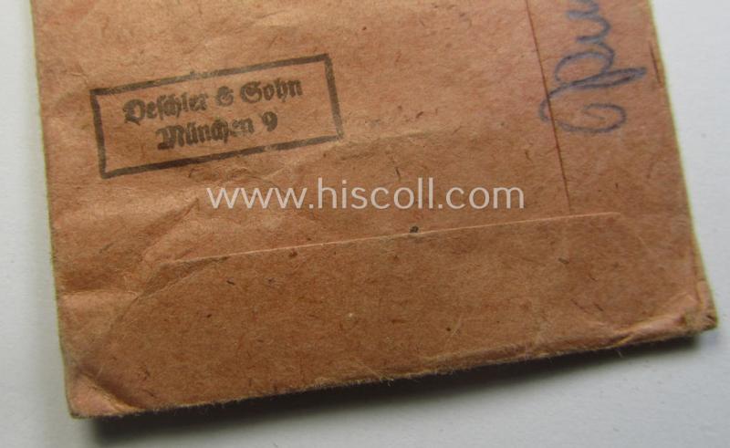 Medal-set: 'Winterschlacht im Osten 1941/42' as produced by the: 'Deschler u. Sohn'-company being a clearly maker- ie. '1'-marked specimen that came stored in its original 'Zellstoff'-based pouch of issue as found