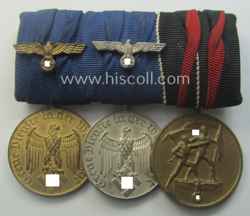 Three-pieced medal-bar (ie. 'Ordenspange') resp. showing two WH (Heeres or KM) so-called: 'DA für 4 u. 12 Jahre treue Dienste' and a: Czech 'Anschluss'-medal '1. Oktober 1938'