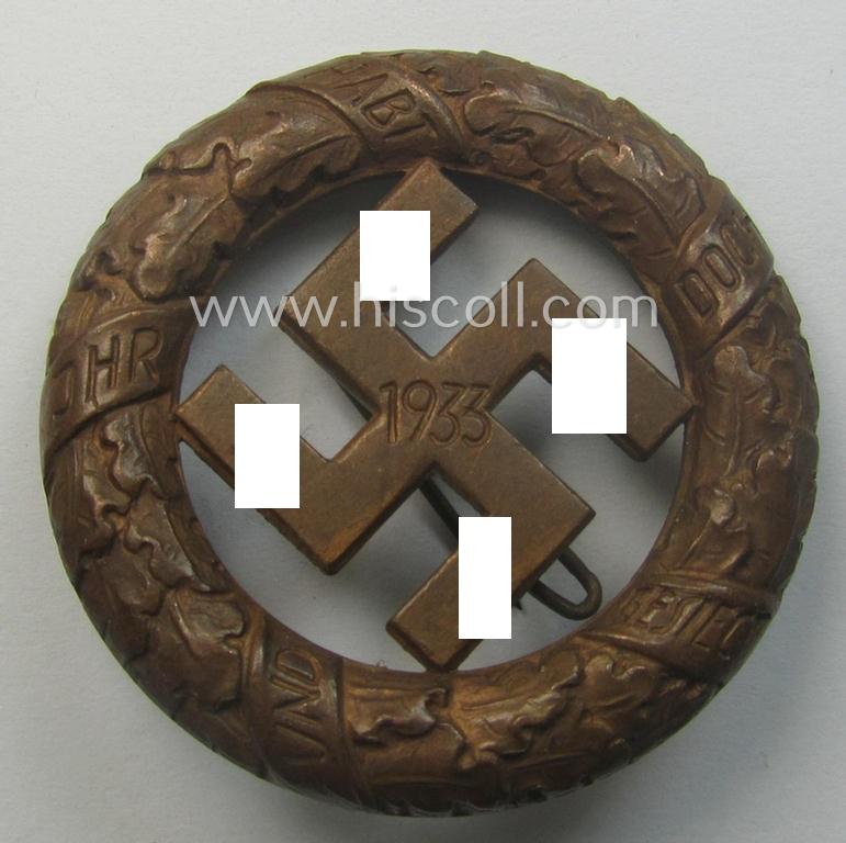 N.S.D.A.P.-related 'Tagungs- o. Veranstaltungsabzeichen' (also referred to as: 'Gau München'-honorary-badge) being a maker- (ie. 'Deschler'-) marked example showing the text: 'Und Ihr habt doch gesiegt - 1933!'