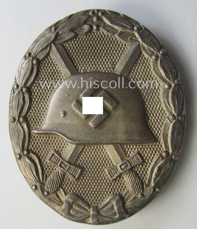 Silver-class wound-badge (or: 'Verwundeten-Abzeichen in Silber') being a maker- (ie. '65'-) marked example as was produced by the 'Hersteller' ie. maker: 'Klein u. Quenzer'