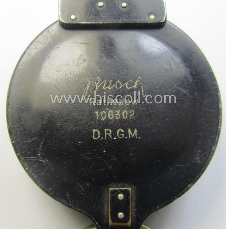 Pre-war-period, 'standard-issue'-pattern and/or (typical) black-coloured (and/or aluminium-based) WH compass (ie. 'Marschkompass') which is nicely maker- (ie. 'Busch - D.R.G.M.'-) marked and/or individually numbered: '106302'