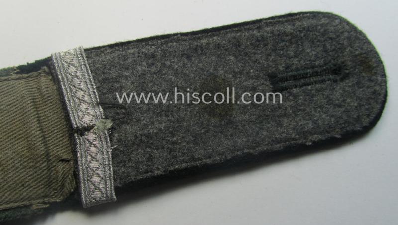 Single - but neverthless scarcely seen! - WH (Heeres) EM-type (ie. 'M40-pattern, rounded-style) 'cyphered' shoulderstrap as was specifically intended for usage by a: 'Soldat u. Uffz.-Anwärter des Pionier-Bataillons 14'