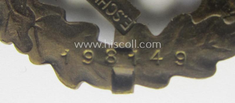Early- (ie. pre-) war-period 'SA Sportabzeichen in Bronze' being a nicely maker- (ie. 'E. Schneider'-) marked example that bears a unique, stamped bearers'-number that reads: '198149' on its back