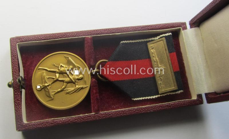 WH Czech-occupation- (ie. 'Anschluss'-) medal: '1. Oktober 1938' that comes with its period-attached 'PB-Spange' and that comes stored in its bordeaux-red-coloured- and/or non-maker-marked etui
