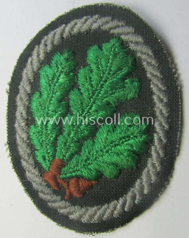 WH (Heeres) 'Jäger'-arm-badge being a desirable 'variant-pattern'-example as was executed in the machine-embroidered style on a thin-shaped- and/or linnen-based background