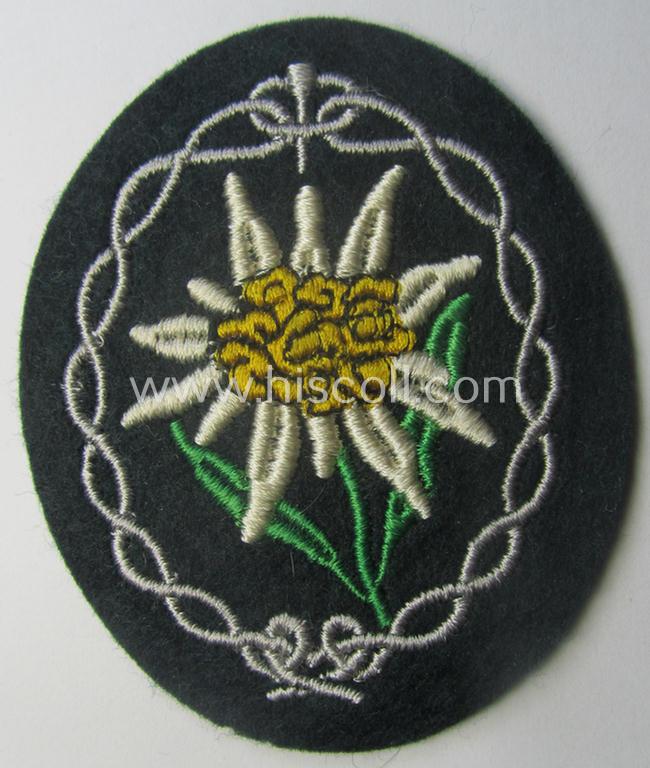 WH (Heeres) EM- (ie. NCO-) type: 'Edelweiss'-armpatch (being a machine-embroidered specimen)