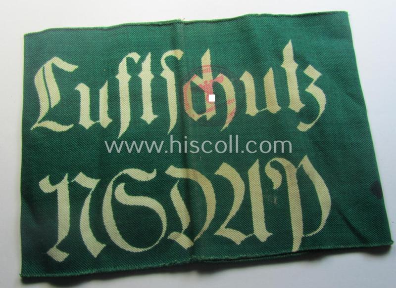 Minimally used - and most certainly rarely seen! - 'N.S.D.A.P.'- (ie. 'Luftschutz'-) related armband (ie. 'Armbinde') being of the 'entirely printed'-type showing a swastika and text: 'Luftschutz NSDAP'