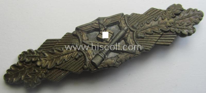 'Nahkampfspange in Bronze' (or: bronze-class close-combat clasp ie. CCC) being a neatly maker-marked- and/or minimally converse-shaped specimen by the maker- (ie. 'Hersteller') 'C.E. Juncker - Berlin'