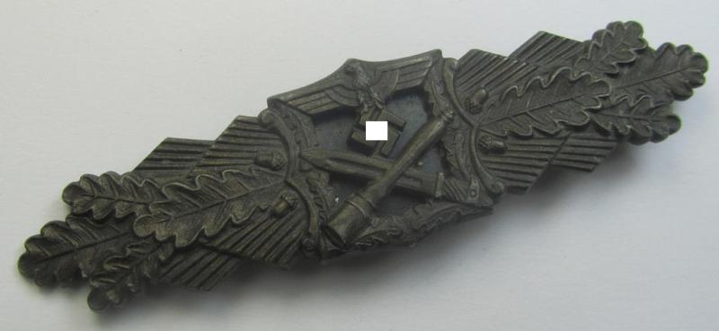 'Nahkampfspange in Bronze' (or: bronze-class close-combat clasp ie. CCC) being a neatly maker-marked- and/or minimally converse-shaped specimen as was produced by the: 'JFS'- (ie. 'Joseph Feix u. Söhne'-) company
