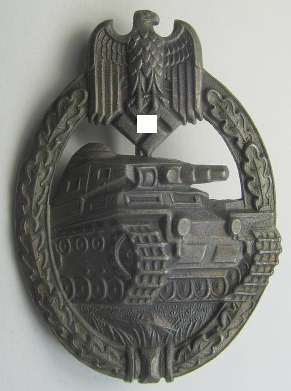 'Panzerkampfabzeichen in Silber' (or: silver-class panzer-assault badge or PAB) being a hollow-type, non-maker-marked- and/or zinc- (ie. 'Feinzink'-) based specimen as was procuced by the: 'Gebr. Wegerhoff'-company
