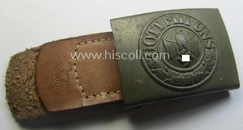 Minimally used, WH (Heeres) field-grey-coloured- and/or steel-based belt-buckle being a (typical) non-maker-marked example that comes mounted onto its maker- (ie. 'C.W. Motz'-) marked and/or '1941'-dated leather-based tab
