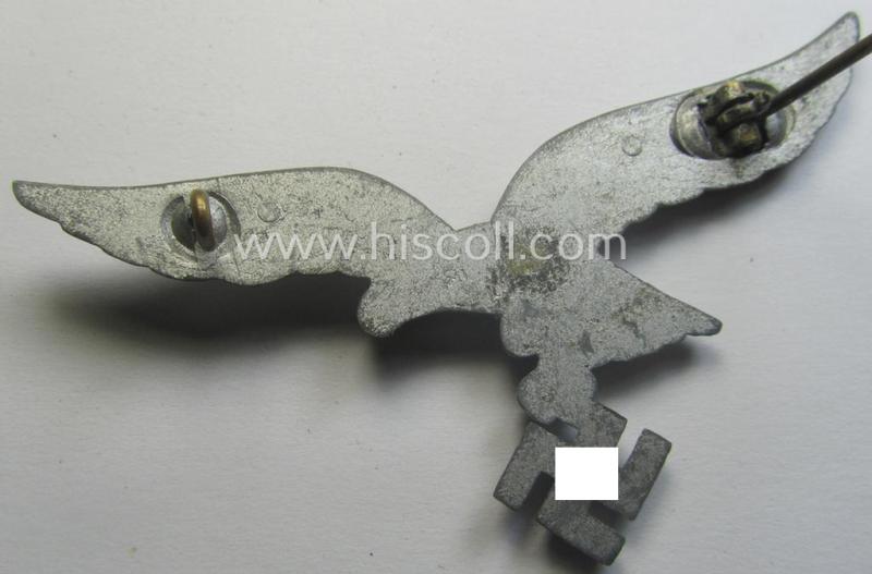 WH (Luftwaffe) zinc- (ie. 'Feinzink'-) based breast-eagle as was specifically intended for usage on the white summer-tunics (ie. 'Brustadler für Sommerrock') being a detailed- albeit non-maker-marked specimen