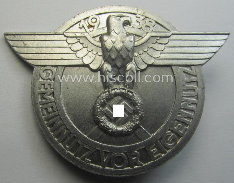 Commemorative, so-called: N.S.D.A.P.-related 'tinnie' (ie. 'Tagungs- o. Veranstaltungsabzeichen') being a clearly maker- (ie. 'Lauer-Nürnberg' and: 'RzM M9/3'-) marked example showing the text: 'Gemeinnutz vor Eigennutz - 1938'