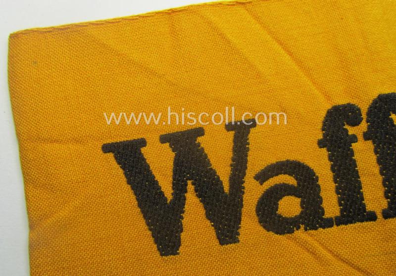 Golden-yellow-coloured- and/or linnen-based armband (ie. 'Armbinde') entitled: 'Waffen-SS'