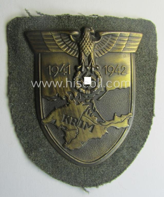 WH (Heeres ie. Waffen-SS) 'Krim'-campaign-shield (as was produced by the desirable maker: 'JFS' ie. 'Joseph Feix & Söhne') and that comes in a presumably issued- (albeit still 'virtually mint'!), condition