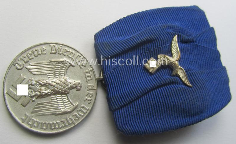 Bright silver-toned - and neatly detachable! - WH (Luftwaffe) so-called: 'Einzelspange' showing a: 'WH-Dienstauszeichnung 4. Stufe' (as was intended for 4 years of loyal-service) and that shows a detailed, LW-type-eagle-device, period-attached