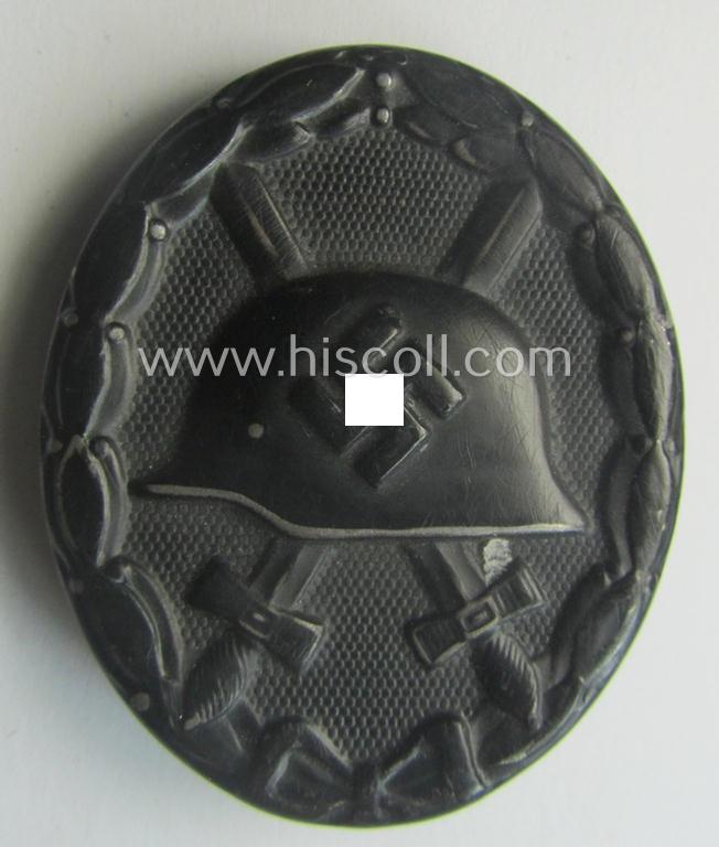 Attractive - and not that often seen! - maker- (ie. 'L/18'-) marked example of a black-class wound-badge (or: 'Verwundeten-Abzeichen in Schwarz') as was produced by the maker- (ie. 'Hersteller'): 'B.H. Mayer's Kunstprägeanstalt'