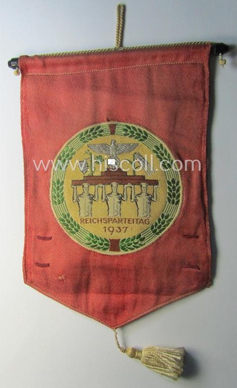 'Patriotic-styled', N.S.D.A.P.-related vehicle- ie. bicycle-flag (ie. 'Fahrrad-Fahne') depicting on one side an interwoven illustration of three men holding a statue of a 'Reichsadler'-device coupled with the text: 'Reichsparteitag 1937'