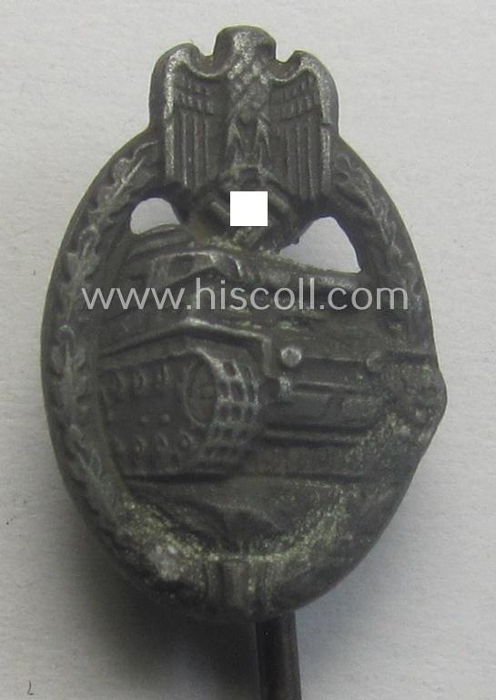 Neat - and 17 mm. sized! - miniature-lapel-pin depicting a: 'Panzerkampfabzeichen in Bronze' (or: bronze-class panzer-assault-badge ie. PAB) being a non-maker-marked example as executed in darkened, bronze-coloured metal