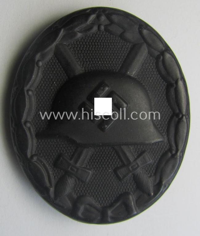 Black-class wound-badge (or: 'Verwundeten-Abzeichen in Schwarz') being a maker- (ie. '4'-) marked specimen as was produced by the maker (ie. 'Hersteller') named: 'Steinhauer & Lück'