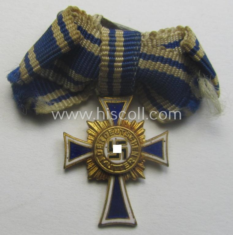 Miniature of an: 'Ehrenkreuz der deutschen Mutter - erste Stufe' (or: golden-class mothers'-cross) being a neatly maker- (ie. 'L/11'-) marked example that comes in an overall nice- (albeit moderately worn- ie. used-), condition