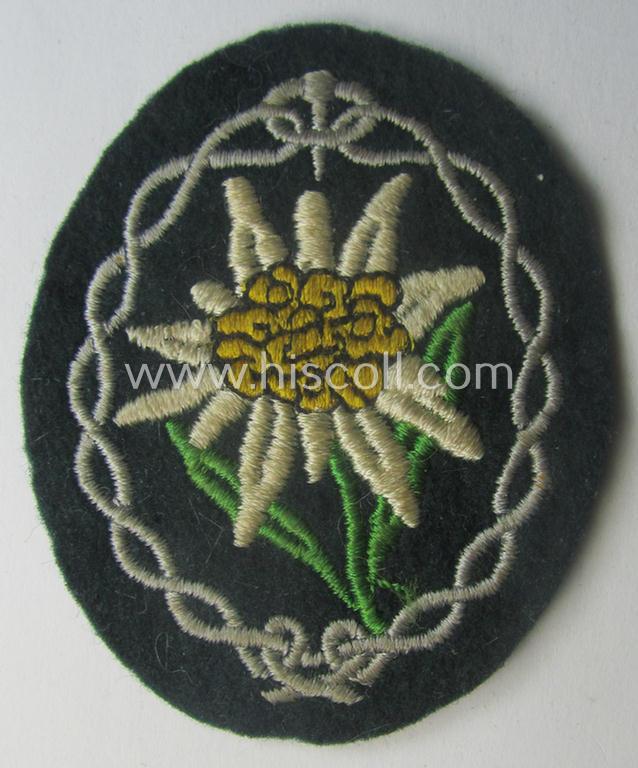WH (Heeres) EM- (ie. NCO-) type: 'Edelweiss'-armpatch (being a machine-embroidered specimen)