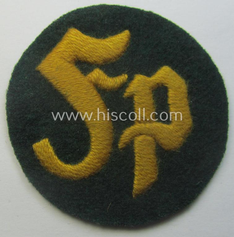 WH (Heeres) so-called: trade- and/or special-career arm-insignia as was intended for a: 'Festungspionier-Feldwebel' (being a neatly hand-embroidered variant mounted on darker-green-coloured wool)