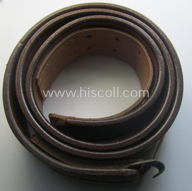 Hardly used, early- (ie. mid-) war-period, black-coloured WH (Heeres, Luftwaffe, Waffen-SS etc.) 'standard-issue'-pattern belt (ie. 'Koppelriemen') being a 100 cms. sized example that shows a (clear) makers'-designation and/or date: '1941'