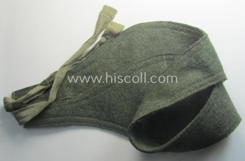 Later-war- (ie. 1943-) pattern, field-grey-coloured, WH (Heeres, Waffen-SS etc.) so-called: 'Ohrenschützer' being intended to be worn in conjunction with the 'M43'-field-caps (ie. 'Einheitsfeldmützen')