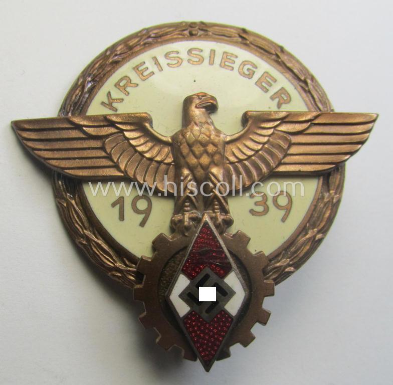 'HJ'- ('Hitlerjugend') ie. 'BDM'- ('Bund Deutscher Mädel') related: 'Reichsberufswettkampf-Siegerabzeichen' (of the 2nd model) entitled: 'Kreissieger 1939' and being a neatly maker- (ie.: 'H. Aurich'-) marked example