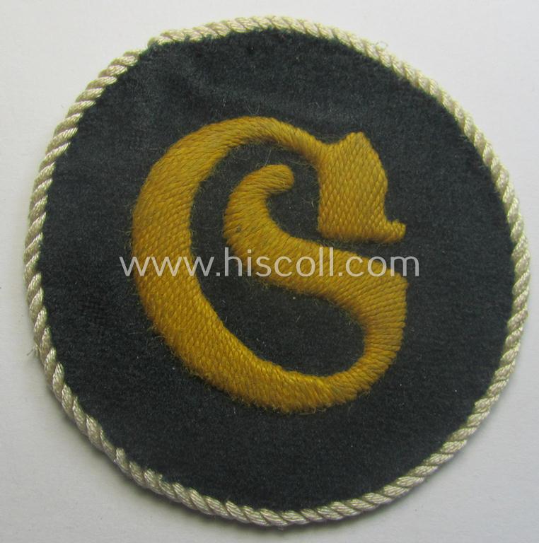 Truly used- and/or worn, WH (Heeres) hand-embroidered, trade- and/or special-career insignia (ie. 'Tätigkeitsabzeichen') as executed on a darker-green-coloured background as was intended for a: 'geprüfter Schirrmeister'