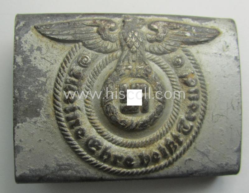 Waffen-SS, EM- (ie. NCO-) type belt-buckle (being a typical, unmarked and typical steel-based: 'Overhoff & Cie'-example) that comes in a surely issued- and/or moderately used- ie. worn, condition