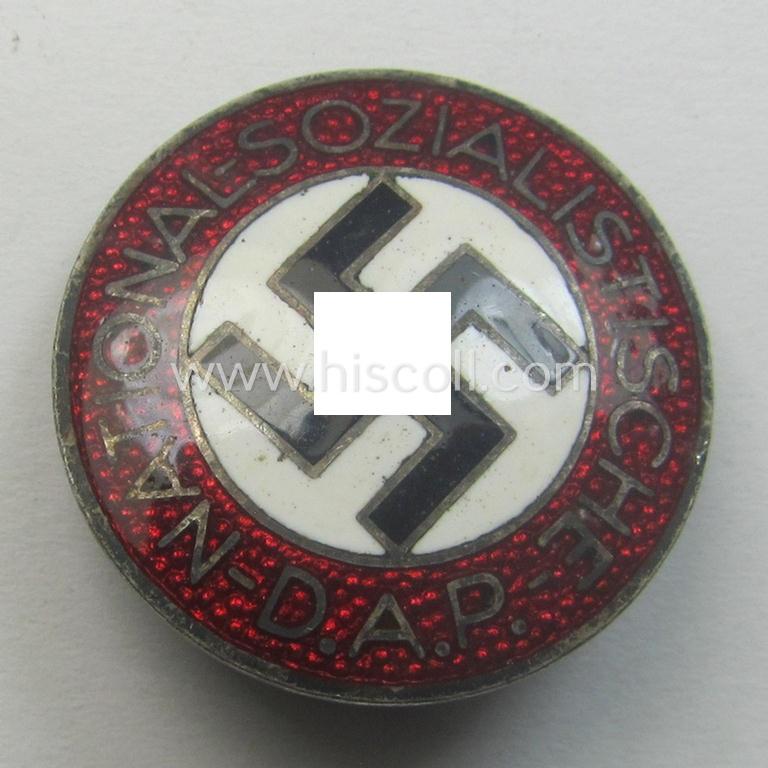 'N.S.D.A.P.'-membership-pin- ie. party-badge (or: 'Parteiabzeichen') which is maker-marked on its back with the makers'-designation: 'RzM' and/or: 'M1/34'