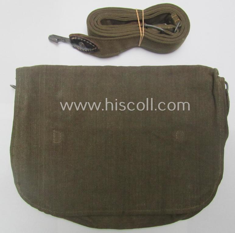 Mid- ie. later-war-period - somewhat smaller-sized and female-related - so-called: 'Brotbeutel für Nachrichtenhelferinnen' that comes mounted onto its period carrying-strap and that comes in an overall nicely preserved, condition