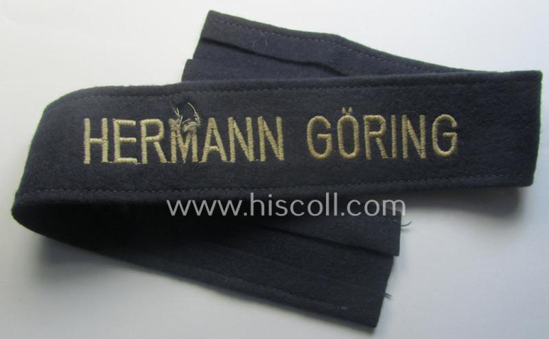 Typical 'smooth-woolen'-based, enlisted-mens'- (ie. NCO-) pattern WH (Luftwaffe) cuff-title (ie. 'Ärmelstreifen') entitled: 'Hermann Göring' (being an I deem presumably issued- albeit never worn nor tunic-attached and minimally damaged example)