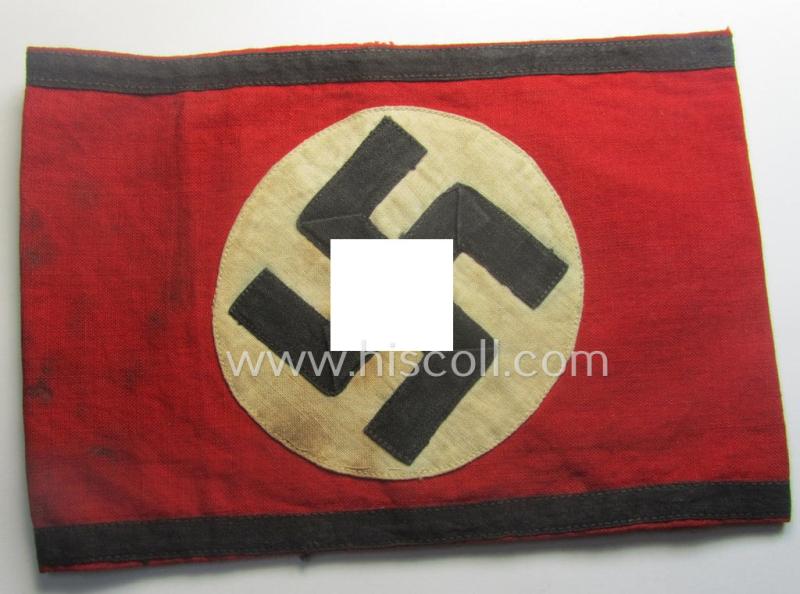 Scarcely encountered - and just moderately used! - so-called: 'Allgemeine-SS'-related armband (ie. 'Armbinde') being a printed specimen showing a separately-applied (and linnen-based) swastika (ie. roundel) attached
