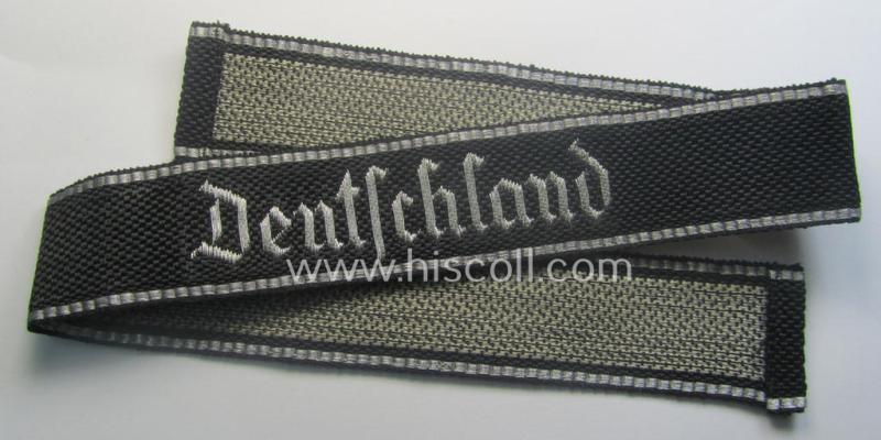 Stunning, Waffen-SS officers-type, 1939/40-pattern cuff-title (ie. 'Ärmelstreifen') as executed in flat-wire 'BeVo'-weave-pattern (in Gothic-styled script!) for an officer who served within the: SS-Rgt. 'Deutschland' (2. SS-Pz-Div. 