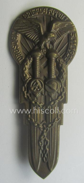 Commemorative, tin-based SA- (ie. 'Sturmabteilungen') related 'tinnie' being a maker- (ie. 'Hoffstätter-Bonn'-) marked example depicting the SA-logo and text (ie. date) that reads: 'Dresden - Brigade-Appell - 5.11.-1933'