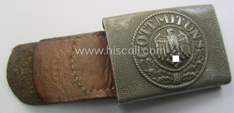WH (Heeres) 'standard-pattern', field-grey-toned- and aluminium-based belt-buckle being a maker- (ie. 'H. Arld - Nuernberg'-) marked- and/or: '1937'-dated example that comes mounted onto its leather-based tab