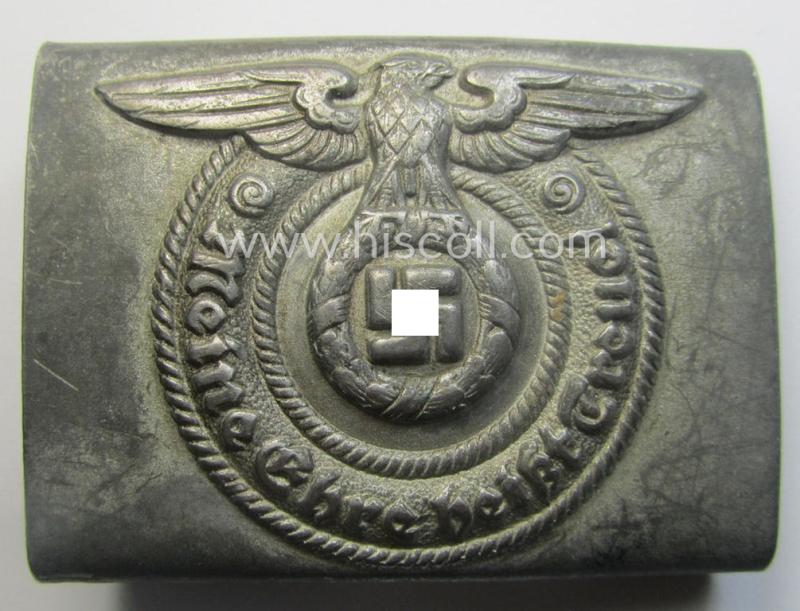Waffen-SS, EM- (ie. NCO-) type belt-buckle (being a typical, unmarked and typical steel-based: 'Overhoff & Cie'-example) that comes in a surely issued- and/or moderately used- ie. worn, condition