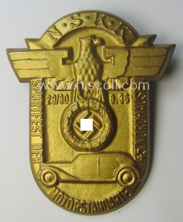 Commemorative, N.S.K.K.-related 'tinnie' being a non-maker-marked example depicting an illustration of the N.S.K.K.-logo (ie. eagle-device) and car coupled with the text: ' N.S.K.K. Sportfest der Motorstandarte 45 - Nordhausen - 29./30.8.36'