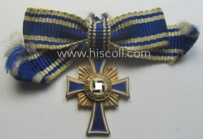Miniature of an: 'Ehrenkreuz der deutschen Mutter - erste Stufe' (or: golden-class mothers'-cross) being a non-maker-marked example that comes in an overall nice- (albeit moderately worn- ie. used-), condition